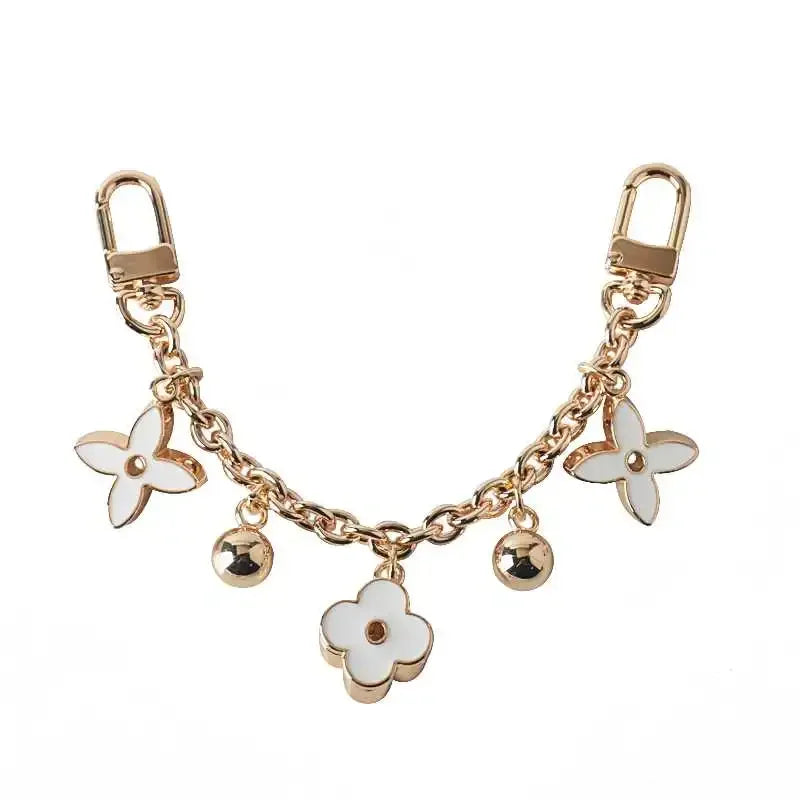 Fashion New Product Black and White Four Leaf Old Flower Trendy Jewelry Bag Decoration Chain Phone Decoration Pendant Accessory 5