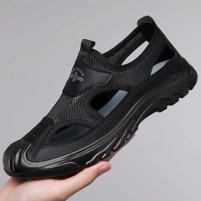 https://cdn.shopify.com/s/files/1/0748/5590/7594/files/ademende-zomersandalen-heren-zwart.jpg?v=1741679118
