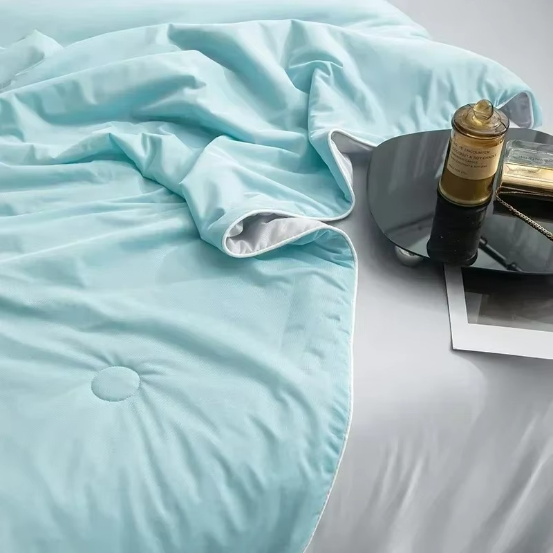 Cooling summer blanket with double-sided cold-touch fabric