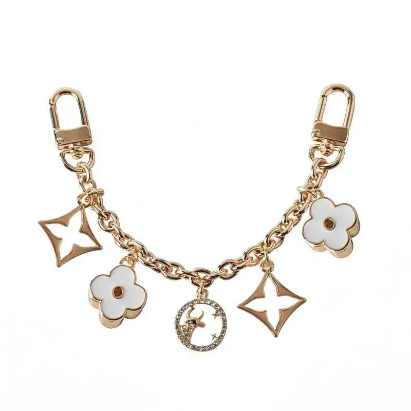 Fashion New Product Black and White Four Leaf Old Flower Trendy Jewelry Bag Decoration Chain Phone Decoration Pendant Accessory 4