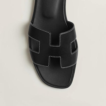 Flache Ledersandalen mit Cut-Out-Design 6