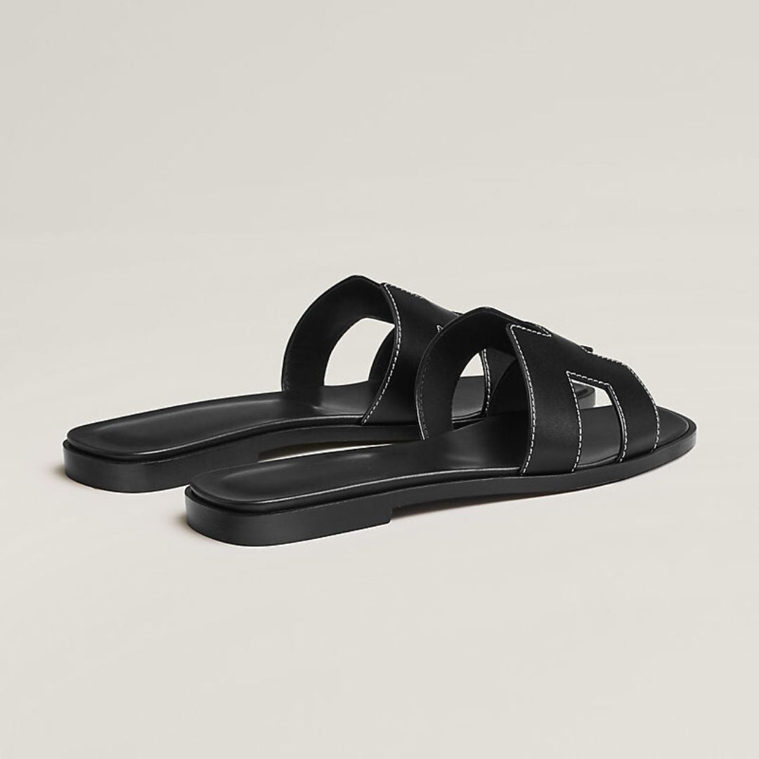 Flache Ledersandalen mit Cut-Out-Design 7