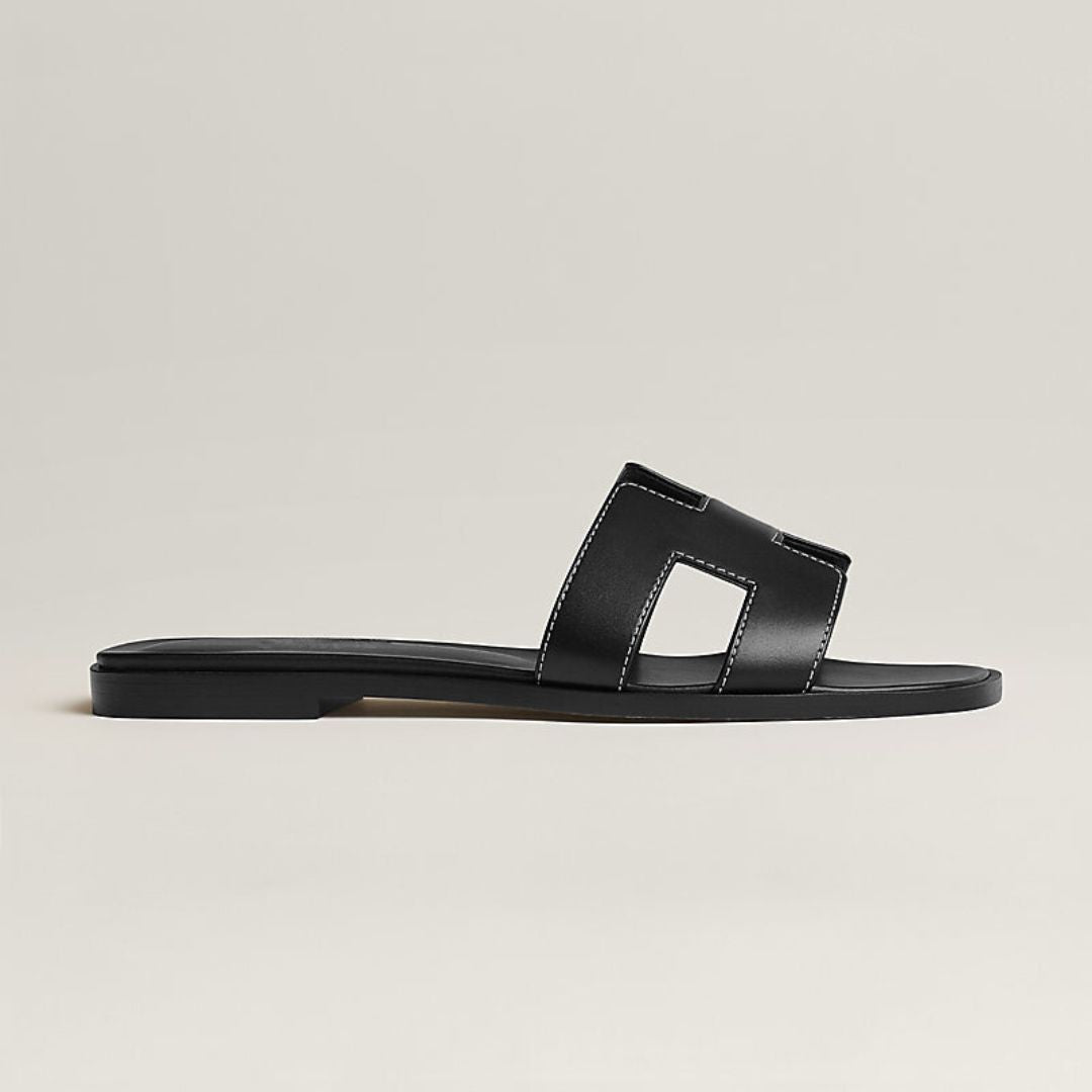 Flache Ledersandalen mit Cut-Out-Design 8