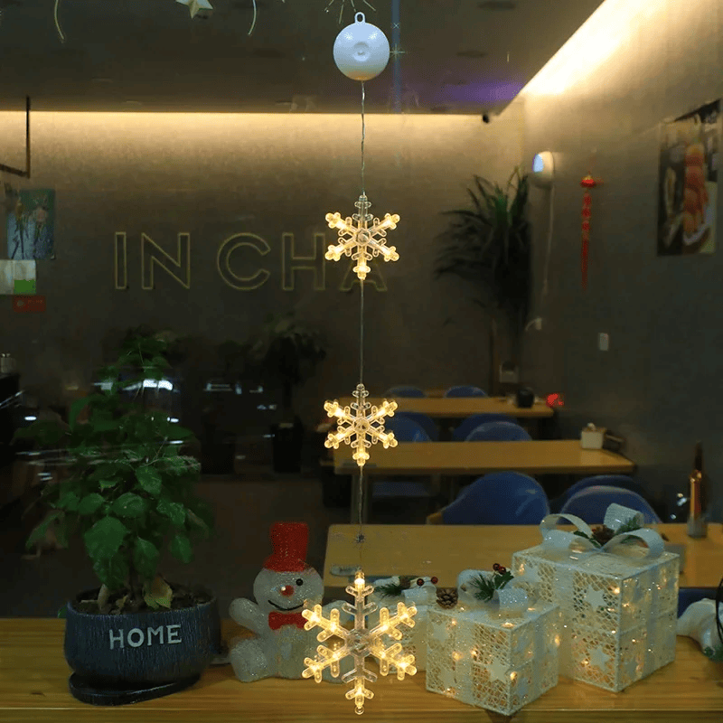 LED Schneeflocken Sternlampe – Dekorative Weihnachtslampe mit Saugnapf für Fenster und Bäume, 10 cm Durchmesser 32