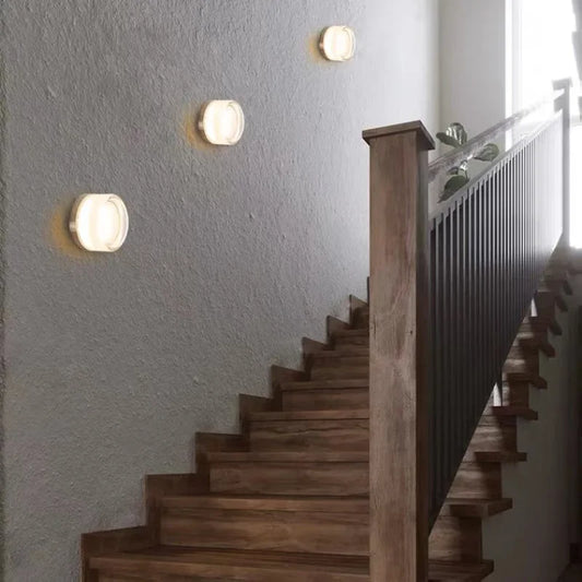 Lámpara de pared redonda moderna – Iluminación ambiental delgada para espacios contemporáneos