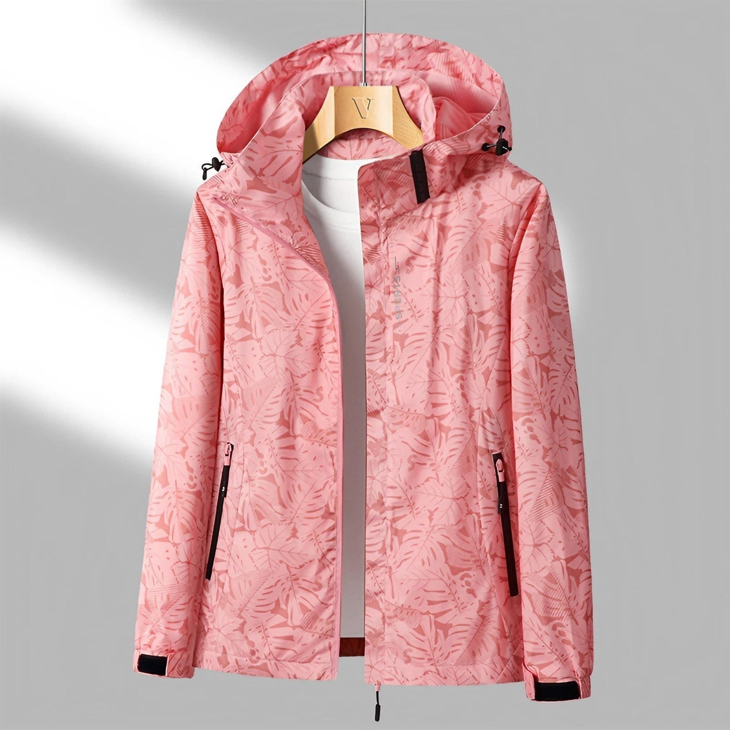 Giacca outdoor leggera da donna – impermeabile con cappuccio regolabile e tasche con cerniera