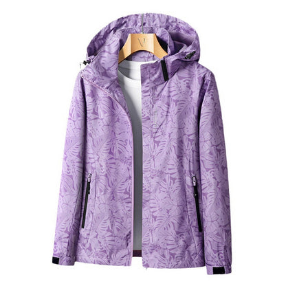 Giacca outdoor leggera da donna – impermeabile con cappuccio regolabile e tasche con cerniera