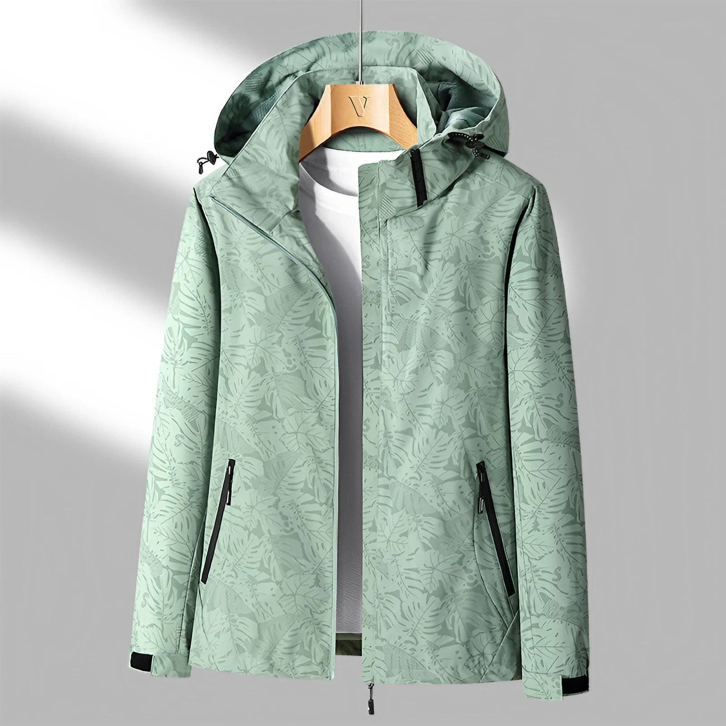 Giacca outdoor leggera da donna – impermeabile con cappuccio regolabile e tasche con cerniera