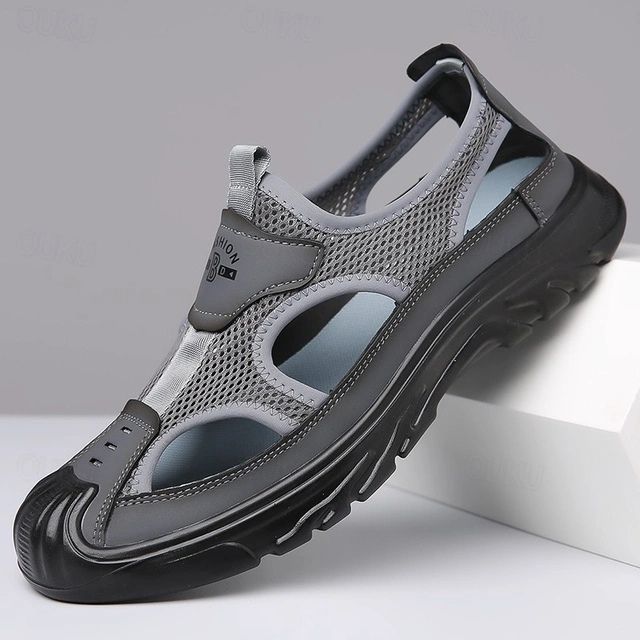 https://cdn.shopify.com/s/files/1/0748/5590/7594/files/ademende-zomersandalen-heren-grijs.jpg?v=1741679140