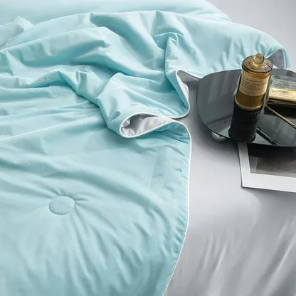 Cooling summer blanket with double-sided cold-touch fabric