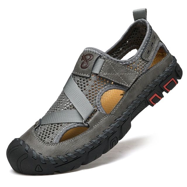 https://cdn.shopify.com/s/files/1/0748/5590/7594/files/mannen-outdoor-wandelen-zomersandalen-grijs.jpg?v=1741678395