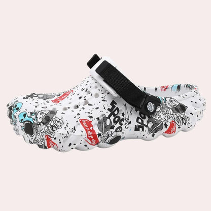 https://cdn.shopify.com/s/files/1/0748/5590/7594/files/zomerse-sandalen-strand-heren-wit.jpg?v=1740640485